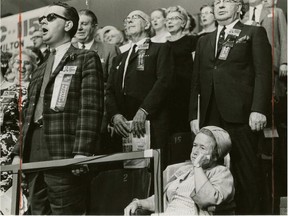 Former Ottawa mayor Charlotte Whitton refused to recognize O Canada as the national anthem and stayed seated at a 1967 event while others stood to sing. Fred Ross/The Canadians