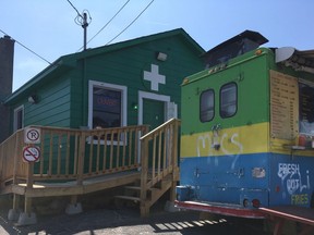 The Ottawa Cannabis Dispensary on Laperriere  Avenue is next to a chip truck.  It's been issued a second notice for violating city zoning.