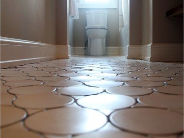 A close look at the bathroom floor tiles in the Minto Home for the CHEO Dream of a Lifetime Lottery in Ottawa.