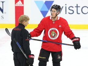 Senators centre Kyle Turris listens to assistant coach Rob Cookson after the team's workout at Canadian Tire Centre on Friday. Jean Levac/Postmedia