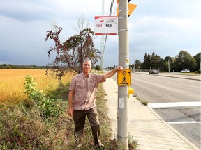 Steve Anderson is trying to get OC Transpo's attention about a bus stop marooned on a sidewalk between Eagleson Road and the greenbelt before winter arrives. He believes it's a dangerous area to wait for a bus when there's snow and ice.