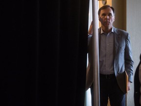 Finance Minister Bill Morneau prepares to talk to reporters during a Liberal caucus retreat in Kelowna, B.C., on Wednesday. His new plan could prove more taxing than he thought.