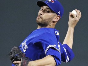 Toronto Blue Jays starting pitcher Marco Estrada delivers during the first inning of a baseball game against the Boston Red Sox at Fenway Park in Boston, Wednesday, Sept. 27, 2017.