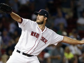 Boston Red Sox's Drew Pomeranz pitches during the first inning of a baseball game against the Toronto Blue Jays in Boston, Monday, Sept. 25, 2017. (AP Photo/Michael Dwyer)
