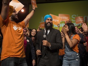 Leadership contender Jagmeet Singh dances on stage with supporters after speaking at the NDP's Leadership Showcase in Hamilton, Ont. on Sunday September 17 , 2017.