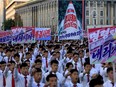 North Koreans gather at Kim Il Sung Square to attend a mass rally against America on Sept. 23 in Pyongyang.
