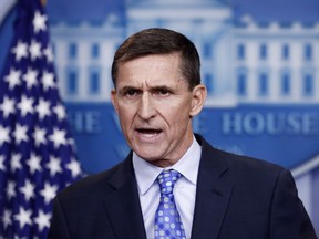 FILE - In this Feb. 1, 2017, file photo, National Security Adviser Michael Flynn speaks during the daily news briefing at the White House, in Washington. Flynn is facing new scrutiny over his failure to report a June 2015 trip to the Middle East that was part of an effort to build nuclear power plants across the region. Two Democratic lawmakers said in a letter released Wednesday, Sept. 13, that Flynn did not report the trip on his security clearance paperwork as required by law. (AP Photo/Carolyn Kaster, File)