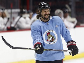 The Ottawa Senators' Erik Karlsson, seen at practice at the Canadian Tire Centre on Wednesday, Sept. 27, 2017, isn't confident he'll be ready for the season opener. 'Most likely not,' he said Wednesday.