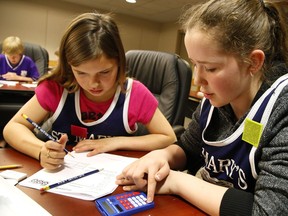 Not everyone hates math: Students in Peterborough put their heads together on some problem-solving at the annual Ontario Math Olympics for Grades 5/6, in April 15, 2016.