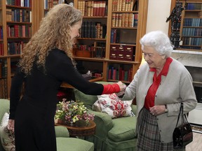 Canadian Governor General Designate Julie Payette, left, meets Britain's Queen Elizabeth II during a private audience at Balmoral Castle, Scotland, Wednesday Sept. 20, 2017.