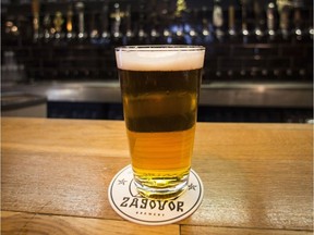 In this July 21, 2017 photo, a glass of craft beer sits on the bar at the Rule Taproom pub in Moscow, Russia. Pint by frothy pint, a hoppy revolution is brewing in Russia. A new generation of craft beer brewers began sprouting in the vodka capital of the world as foreign beers got too expensive and beer-drinkers started looking for alternatives to mass-produced lagers.  (AP Photo/Alexander Zemlianichenko) ORG XMIT: NYLS201
Alexander Zemlianichenko, AP