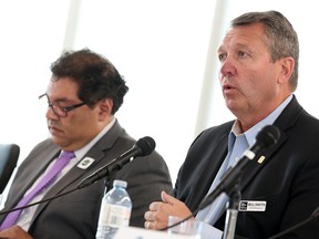 Naheed Nenshi, left, and Bill Smith participate in a mayoral forum at Mount Royal University on Sept. 19.