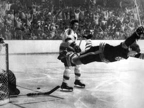 BOBBY ORR IS TRIPPED BY ST. LOUIS DEFENCEMAN NOEL PICARD AFTER BEATING GOALIE GLENN HALL IN OVERTIME  TO WIN 1970 STANLEY CUP.

.