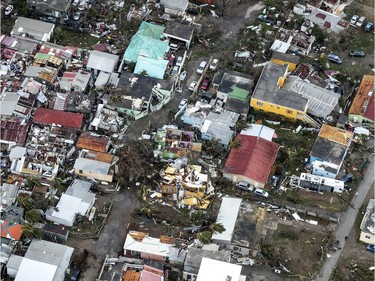 This Sept. 6, 2017 photo provided by the Dutch Defense Ministry shows storm damage in the aftermath of Hurricane Irma, in St. Maarten. Irma cut a path of devastation across the northern Caribbean, leaving thousands homeless after destroying buildings and uprooting trees. Significant damage was reported on the island that is split between French and Dutch control. (Gerben Van Es/Dutch Defense Ministry via AP) ORG XMIT: XLAT123

AP PROVIDES ACCESS TO THIS PUBLICLY DISTRIBUTED HANDOUT PHOTO PROVIDED BY THE DUTCH DEFENSE MINISTRY; MANDATORY CREDIT.
GERBEN VAN ES, AP