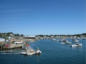 This August 2013 photo shows a view of boats in the harbor at Vinalhaven Island, Maine. Here, reports Andrew Cohen, residents are on the frontline of the battle against climate change. (Beth J. Harpaz, AP)