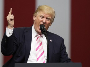 President Donald Trump speaks at a campaign rally in support of Sen. Luther Strange, Friday, Sept. 22, 2017, in Huntsville, Ala.