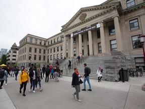 Students walk on campus at the University of Ottawa.