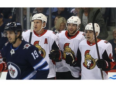 From left, Dion Phaneuf, Bobby Ryan and Jean-Gabriel Pageau celebrate Ryan's goal against the Winnipeg Jets.