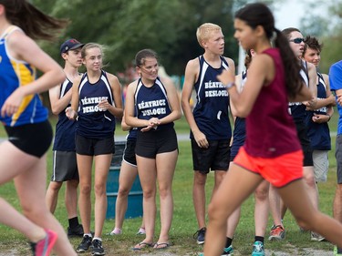 Athletes from Béatrice Desloges cheer on their fellow runners as the 2017 Gryphon Open Cross Country Meet takes place Wednesday at the Terry Fox Athletic Facility.