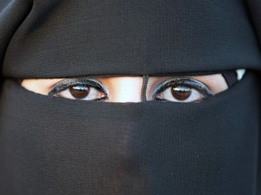 A woman wearing a niqab.