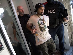 Ottawa Police raided Cannabis Culture on Bank Street Tuesday Oct. 3 and took five men into custody.  It's the second time the illegal marijuana dispensary has been raided.