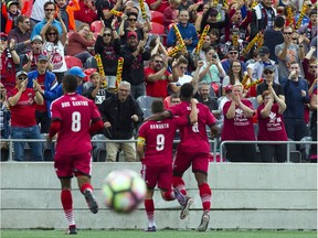 The ball has yet to stop bouncing as Fury FC's Carl Haworth (9) celebrates one of his two goals against FC Cincinnati at TD Place stadium on Sunday.   Ashley Fraser/Postmedia