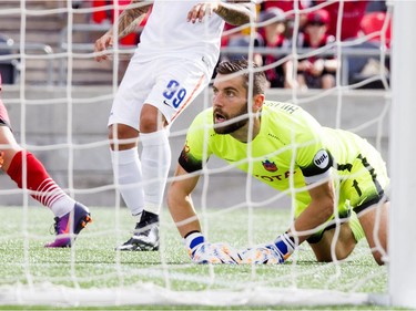 FC Cincinnati keeper Mitch Hildebrandt looks up in frustration after allowing Fury FC's third goal on Sunday.   Ashley Fraser/Postmedia