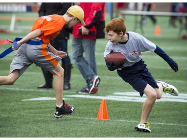 12-year-old Zach Bowen gets his flag caught during a round robin game at TD Place Sunday October 15, 2017.