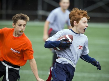 12-year-old Zach runs with the ball during a round robin game at TD Place Sunday October 15, 2017.