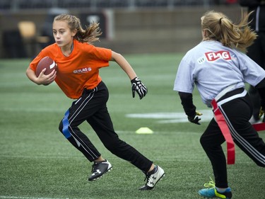 11-year-old Madison Lalonde gets the ball down the field during a round robin game at TD Place Sunday October 15, 2017.