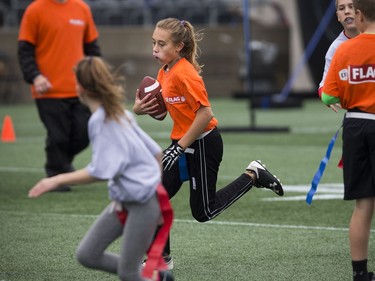 11-year-old Madison Lalonde gets the ball down the field during a round robin game at TD Place Sunday October 15, 2017.