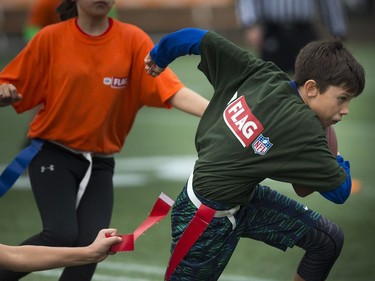 12-year-old Ryan LeBreux has his flag captured during the round robin game at TD Place Sunday October 15, 2017.