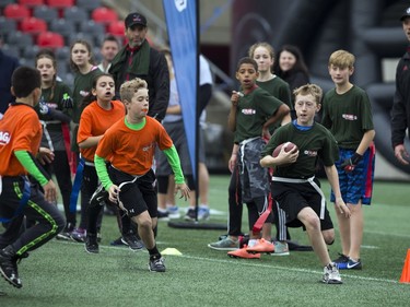 12-year-old Kent Moors gets the ball down the field during a round robin game at TD Place Sunday October 15, 2017.