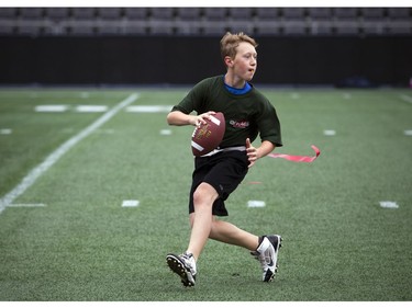 12-year-old Kent Moors gets the ball down the field during a round robin game at TD Place Sunday October 15, 2017.