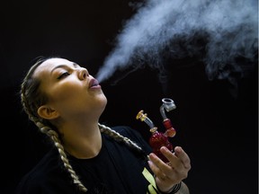 Tina Ronison shows how she vaporizes by dabbing on a quartz banger at the Cannabis & Hemp Expo on Saturday, Oct. 28, 2017 at the Shaw Centre.