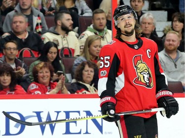 Erik Karlsson back on ice during first-period action between the Ottawa Senators (red) and the Vancouver Canucks Tuesday (October 17, 2017) at Canadian Tire Centre. Julie Oliver/Postmedia