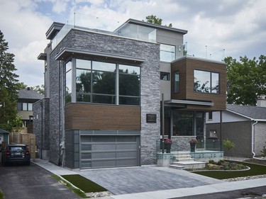 The GOHBA Housing Design Awards 2017 winner in the category Custom Urban Home (3,501 sq. ft. or more) - Contemporary is Carleton Avenue Home Overlooking Champlain Park: HD&P Residential Design.