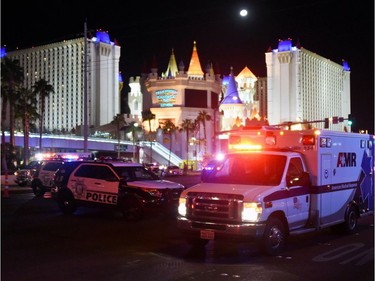 An ambulance leaves the intersection of Las Vegas Boulevard and Tropicana Ave. after a mass shooting at a country music festival nearby on October 2, 2017 in Las Vegas, Nevada. A gunman has opened fire on a music festival in Las Vegas, leaving at least 20 people dead and more than 100 injured. Police have confirmed that one suspect has been shot. The investigation is ongoing.