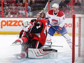 Senators forward Alex Burrows crashed into netminder Craig Anderson, and moments later the Canadiens score another first-period goal.  Jana Chytilova/Freestyle Photography/Getty Images