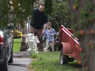Joshua Boyle and his son Jonah play in the garden at his parents' house in Smiths Falls.