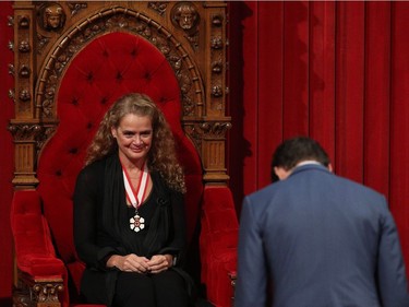 Canadian Prime Minister Justin Trudeau bowes to the new the Governor general Julie Payette at the senate in Ottawa, Ontario, October 2, 2017.  The former astronaut Julie Payette is the 29th Governor General of Canada.