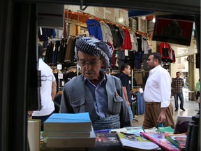 IRAQ-KURDS-CONFLICT

An Iraqi Kurdish man looks at books in the central square near the Citadel in Arbil, the capital of the autonomous Kurdish region of northern Iraq, on October 25, 2017. / AFP PHOTO / SAFIN HAMEDSAFIN HAMED/AFP/Getty Images
SAFIN HAMED, AFP/Getty Images