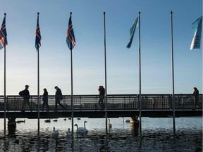 Voters go to a polling station in the city hall in Reykjavik during the election on October 28, 2017 in Reykjavik.