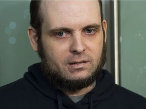 Joshua Boyle speaks to the media after arriving at the Pearson International Airport in Toronto on Friday, Oct. 13, 2017.