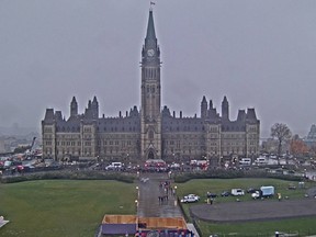 Emergency vehicles in front of Centre Block Tuesday morning. Fire call was a false alarm.