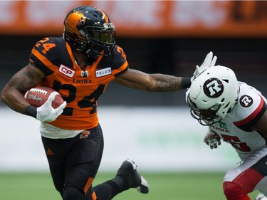 Jeremiah Johnson, Keelan Johnson

B.C. Lions' Jeremiah Johnson, left, fights off Ottawa Redblacks' Keelan Johnson while carrying the ball during the first half of a CFL football game in Vancouver, B.C., on Saturday, October 7, 2017. THE CANADIAN PRESS/Darryl Dyck ORG XMIT: VCRD135
DARRYL DYCK,