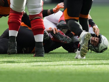 Trevor Harris

Ottawa Redblacks' quarterback Trevor Harris lies on the ground after being sacked by B.C. Lions' Mic'hael Brooks during the first half of a CFL football game in Vancouver, B.C., on Saturday, October 7, 2017. THE CANADIAN PRESS/Darryl Dyck ORG XMIT: VCRD125
DARRYL DYCK,