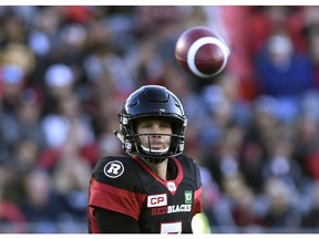 Redblacks quarterback Trevor Harris releases a pass in the Sept. 9 game against the Tiger-Cats. He was injured later that night and hasn't played in a game since, but could start Saturday in Vancouver against the Lions. THE CANADIAN PRESS/Justin Tang
