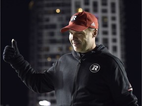 Redblacks head coach Rick Campbell gives a thumbs up to fans after Friday's 41-36 victory against the Ticats at TD Place stadium. The Redblacks have a bye in the final week of the regular season and they could end up with another week off, too, if the Lions beat the Argos this Saturday. THE CANADIAN PRESS/Justin Tang