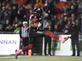 Ottawa Redblacks running back William Powell (29) kicks his feet in celebration as he runs in the end zone after scoring a touchdown against the Hamilton Tiger-Cats during second half CFL action in Ottawa on Friday, Oct. 27, 2017.